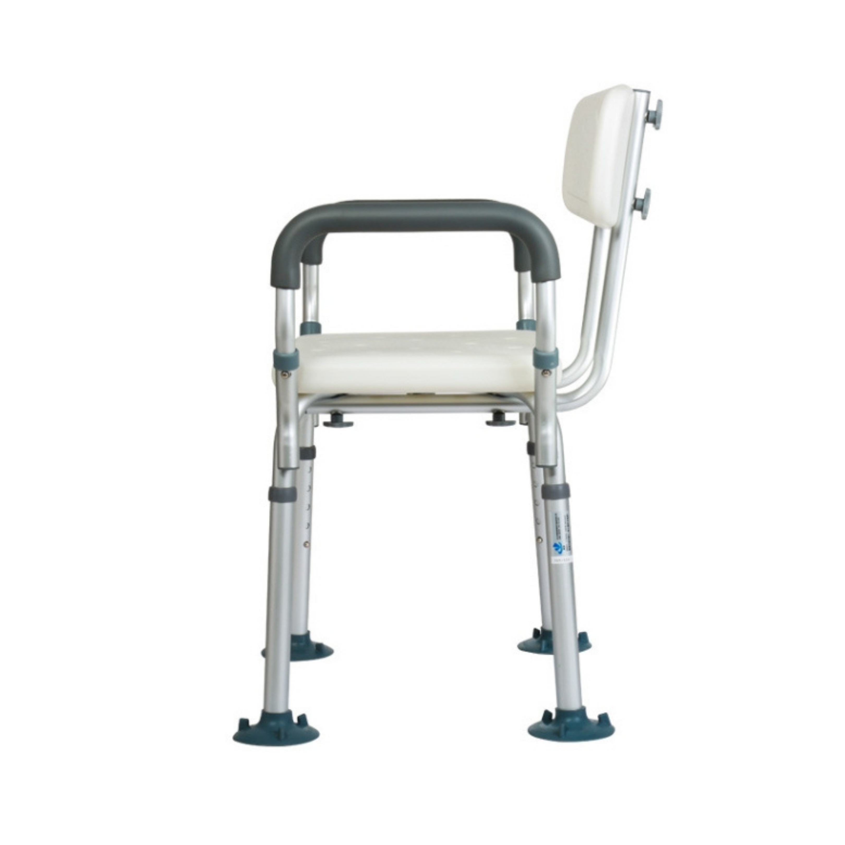 White shower chair with grey adjustable frame, padded armrests and suction‑style feet, shown on a white background to display condition